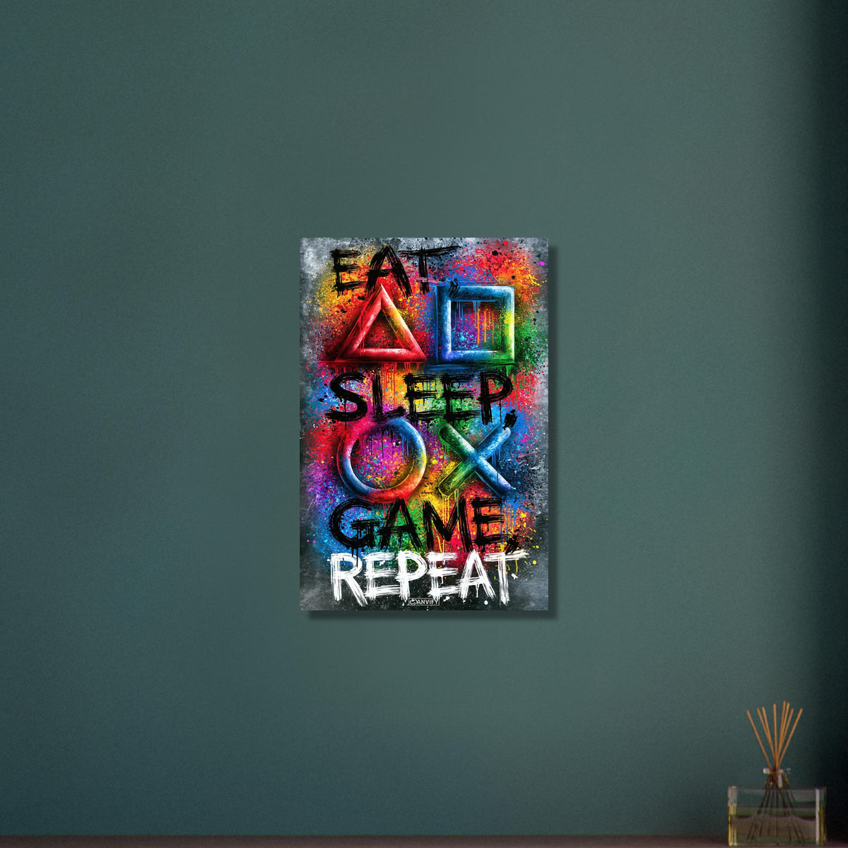 Spruch mit Symbolen der Playstation 'Eat, Sleep, Game, Repeat' mit bunten Farben auf Aluminium