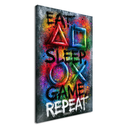 Spruch mit Symbolen der Playstation 'Eat, Sleep, Game, Repeat' mit bunten Farben auf einer Leinwand