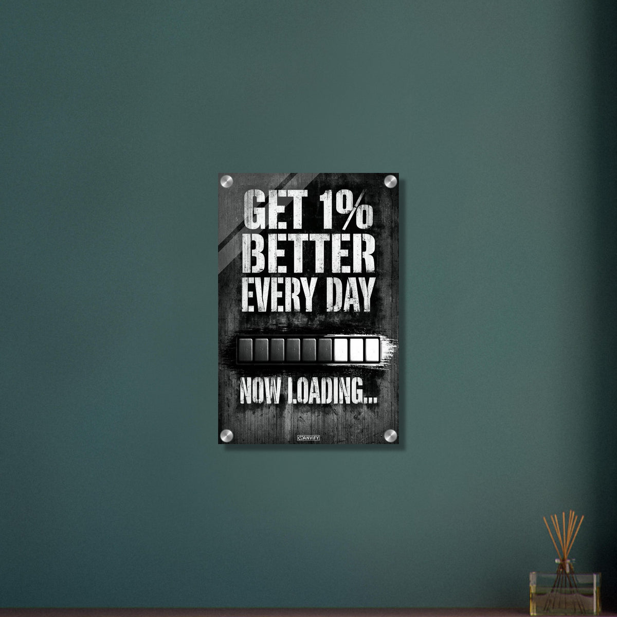 Motivationsspruch mit Ladebalken 'Get 1% Better Every Day' auf einem Acrylbild