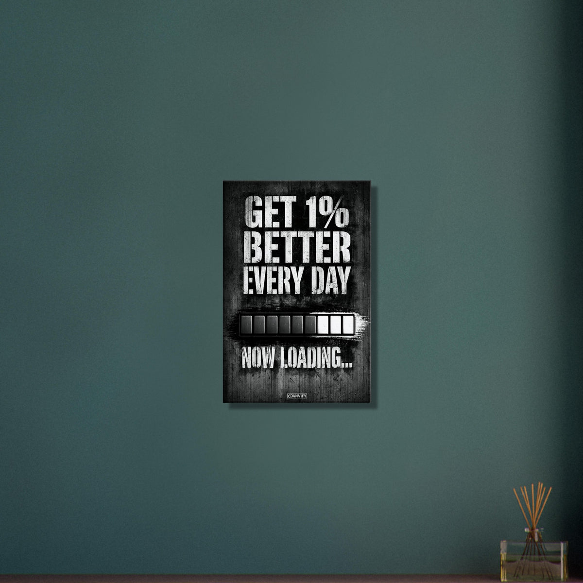 Motivationsspruch mit Ladebalken 'Get 1% Better Every Day' auf einer Leinwand