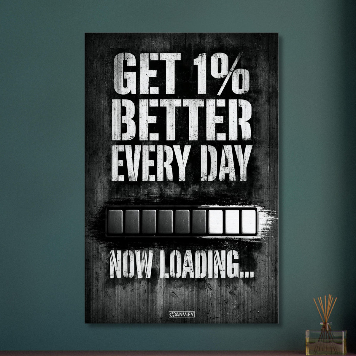 Motivationsspruch mit Ladebalken 'Get 1% Better Every Day' auf einer Leinwand