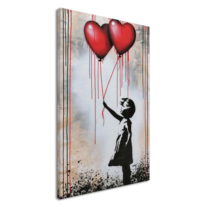 Kleines Mädchen hält zwei Herzluftballons fest im Banksy Stil auf einer Leinwand