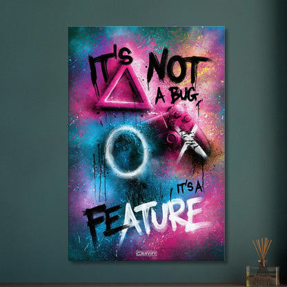 Spruch 'It's Not A Bug It's A Feature' im Graffiti Street Art Stil mit einem Playstation Controller auf einer Leinwand