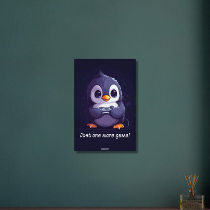 Baby-Pinguin spielt mit einem Controller auf Aluminium