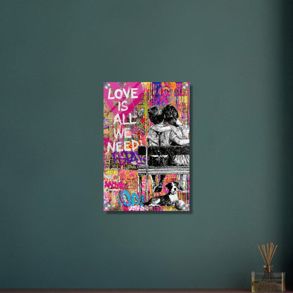 Mädchen und Junge sitzen umarmt auf der Bank im Banksy und Pop Art Stil mit einem Hund und dem Spruch "Love Is All We Need" auf einem Acrylbild