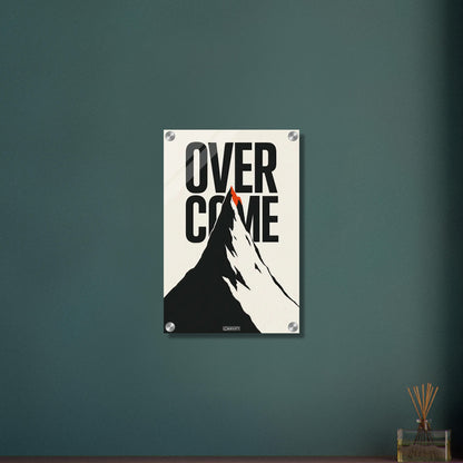 Minimalistisch gezeichneter Berg in Schwarz und Weiß mit einem Spruch 'Overcome' und mit einer roten Bergspitze auf einem Acrylbild