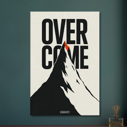 Minimalistisch gezeichneter Berg in Schwarz und Weiß mit einem Spruch 'Overcome' und mit einer roten Bergspitze auf einer Leinwand
