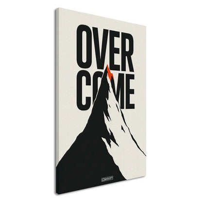 Minimalistisch gezeichneter Berg in Schwarz und Weiß mit einem Spruch 'Overcome' und mit einer roten Bergspitze auf einer Leinwand