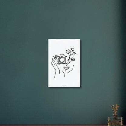 Fotografin mit einer Rose gezeichnet mit einer Linie auf einer Leinwand