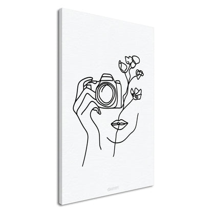Fotografin mit einer Rose gezeichnet mit einer Linie auf einer Leinwand