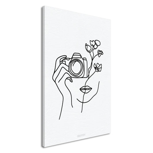 Fotografin mit einer Rose gezeichnet mit einer Linie auf einer Leinwand