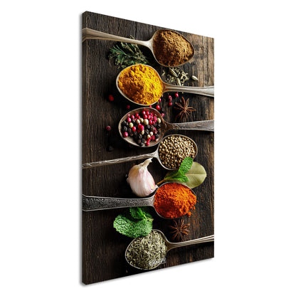 Pfeffer, Harissa, Curry, Kreuzkümmel und Zimt im Löffel auf einer Leinwand