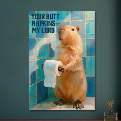 Ein Capybara oder auch Wasserschwein genannt hält eine Klopapierrolle mit einem Spruch 'Your Butt Napkins My Lord' auf einer Leinwand
